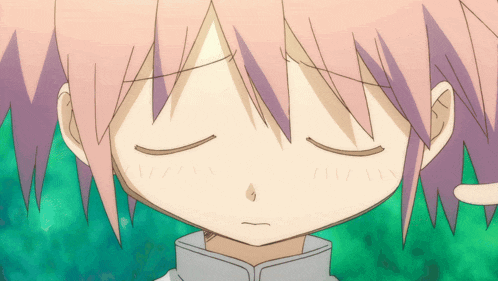 a close up of a person 's face with their eyes closed and a hand touching their forehead