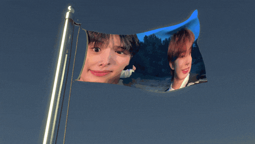 a flag that has a picture of a man on it
