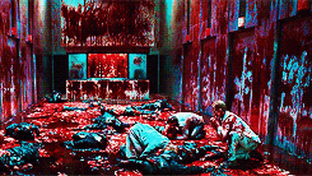 a group of people are kneeling down in a room filled with blood
