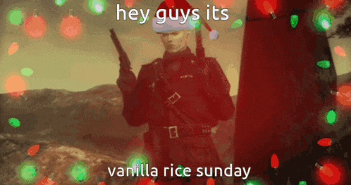 a man in a santa hat is holding two guns and says " hey guys its vanilla rice sunday "