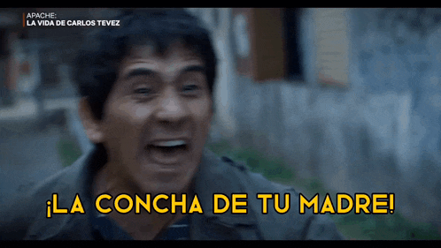a man is screaming with the words la concha de tu madre written in yellow