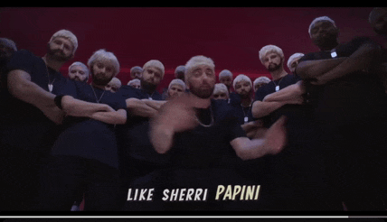 a group of men are standing in a circle with their arms crossed and the words like sherri papini on the bottom right