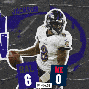 a football player with the number 8 on his jersey is holding a football