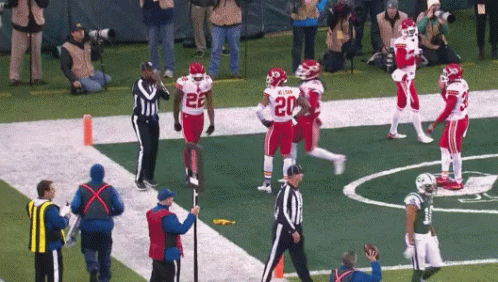 Marcus Peters Throwing Flag GIF - Yellow Flag Penalty Flag GIFs