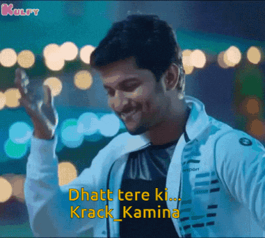 a man wearing a bmw jacket is smiling and says " dhath tere ki ... krack kamina "