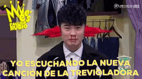 a man in a suit has a red umbrella in his nose