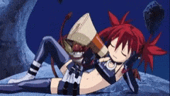 a girl with red hair is laying down with her eyes closed and holding a megaphone .