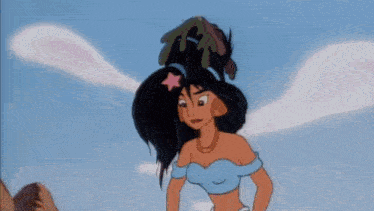 a cartoon character with a star in her hair is standing next to a rock and pointing at something .