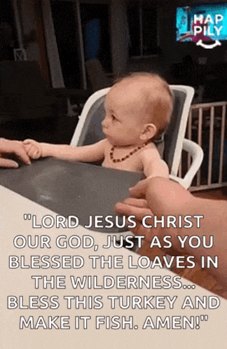a baby is sitting in a high chair while a person feeds it .