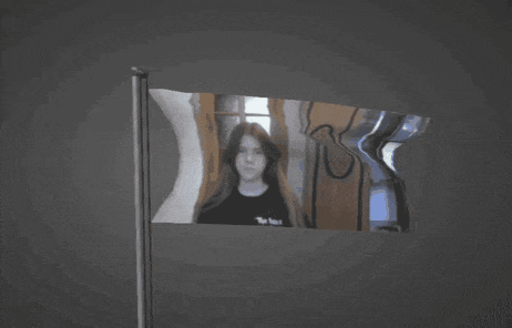 a flag with a picture of a girl on it and the word the on it