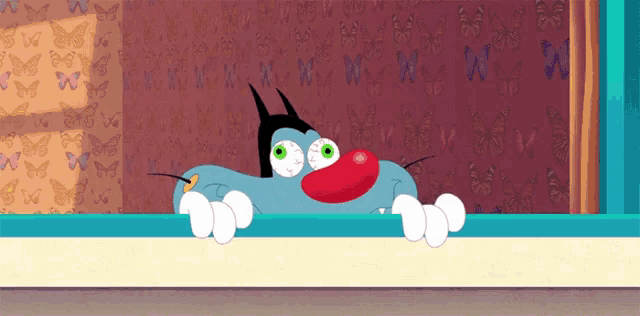 a cartoon character with a red nose and green eyes looks out a window