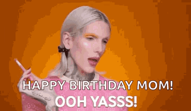 a woman is smoking a cigarette and says `` happy birthday mom ! ''