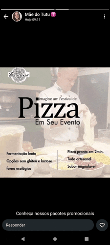 a man is making a pizza in a kitchen