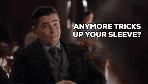 a man in a suit and tie is asking if there are anymore tricks up your sleeve