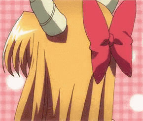 a cartoon character with horns and a red bow