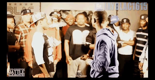 two men standing in front of a crowd with the words colosseum battle league on the top