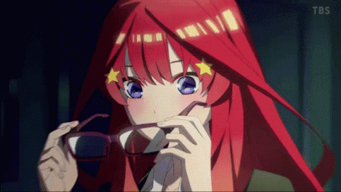 a girl with red hair and blue eyes is holding a pair of glasses ..