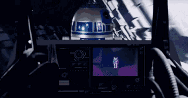 a r2d2 robot is displayed on a screen in a star wars video game