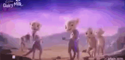 a group of cartoon animals are standing next to each other in a desert .