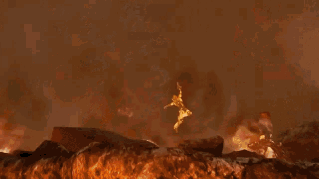 the word fire is written in red on a wall
