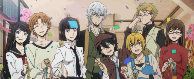 a group of anime characters are posing for a picture with confetti falling around them