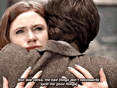 a woman is hugging a man with the words but vice versa the bad things don 't necessarily spoil the good things