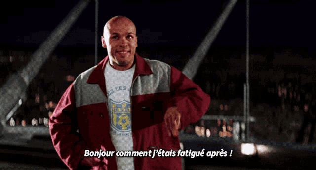 a man wearing a shirt that says bonjour comment j ' étais fatigué apres
