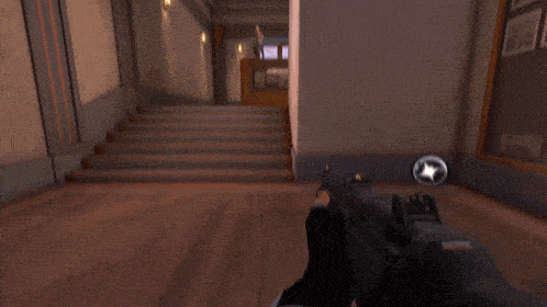 a person holding a gun with a bullet coming out of it in a hallway