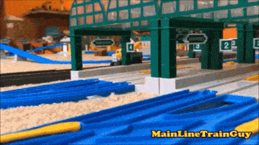 a train set with the words mainline train guy on the bottom right