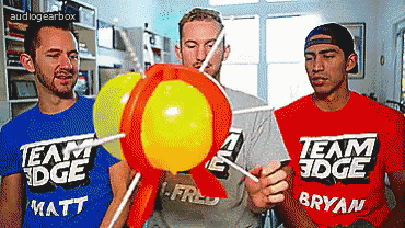 three men wearing shirts that say team edge