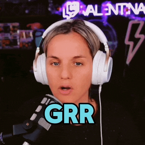 a woman wearing headphones says grr in a video