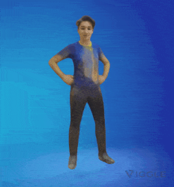 a man in a blue shirt is jumping in the air with the word vigge below him
