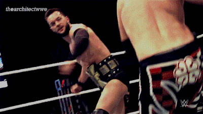 two wrestlers are fighting in a ring with the words the architectwwe on the bottom