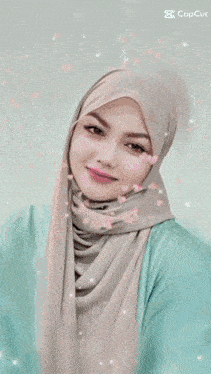 a woman wearing a hijab and a capcut logo