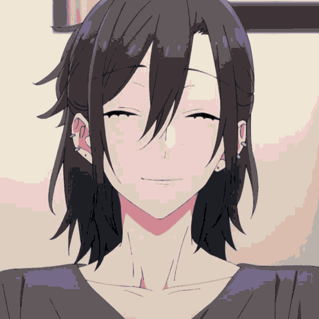 a close up of a person 's face with a smile on their face