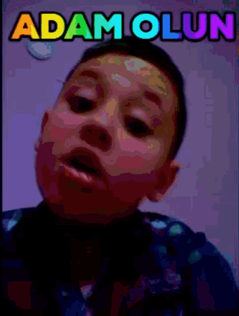 a picture of a young boy with adam olsun written on the bottom