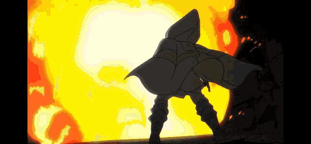 a man in a cape is standing in front of a large explosion