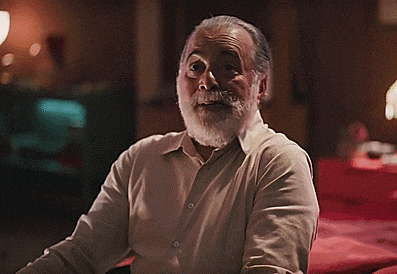 a man with a beard has the words fazia tempo que eu não me sentia assim