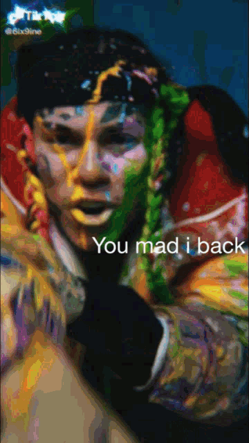 a painting of a person with the words " you mad i back " on it