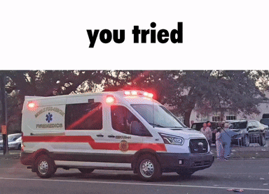 an ambulance that says you tried is parked on the street