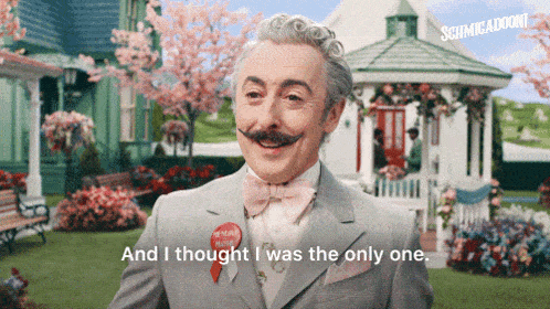 a man in a suit and bow tie with the words and i thought i was the only one