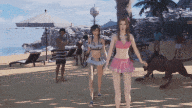 a woman in a pink bikini stands next to another woman in a blue bikini