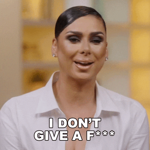a woman in a white shirt says " i don t give a f *** "