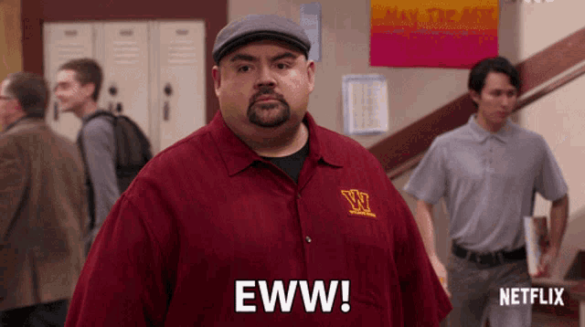 a man in a red shirt says eww in front of a netflix sign