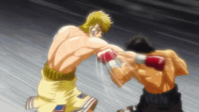 two men are boxing and one has the word kon on his short