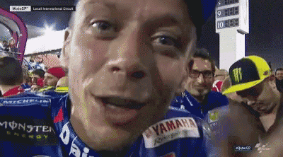 a man wearing a blue shirt that says yamaha