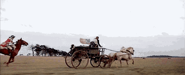 a horse drawn carriage with an american flag on the back