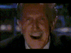 a close up of a man 's face with blood dripping from his mouth