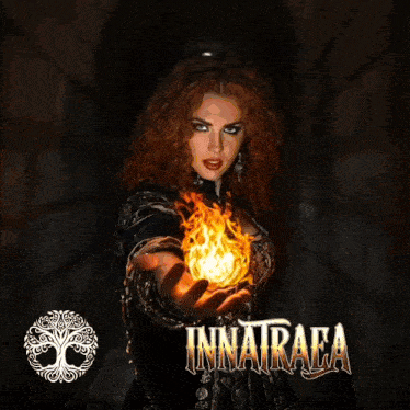 a poster of a woman holding a fireball with the name innatrafa