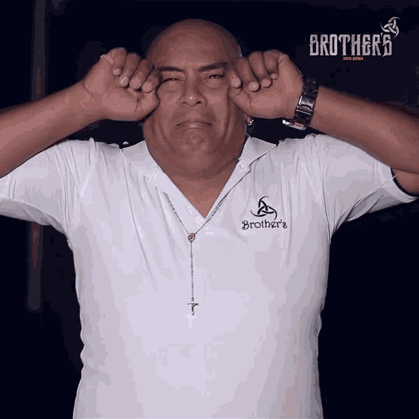 a man wearing a white shirt that says brothers